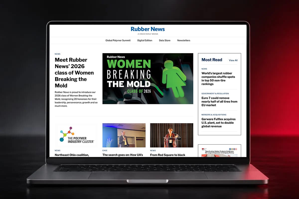 The Rubber News homepage on a laptop